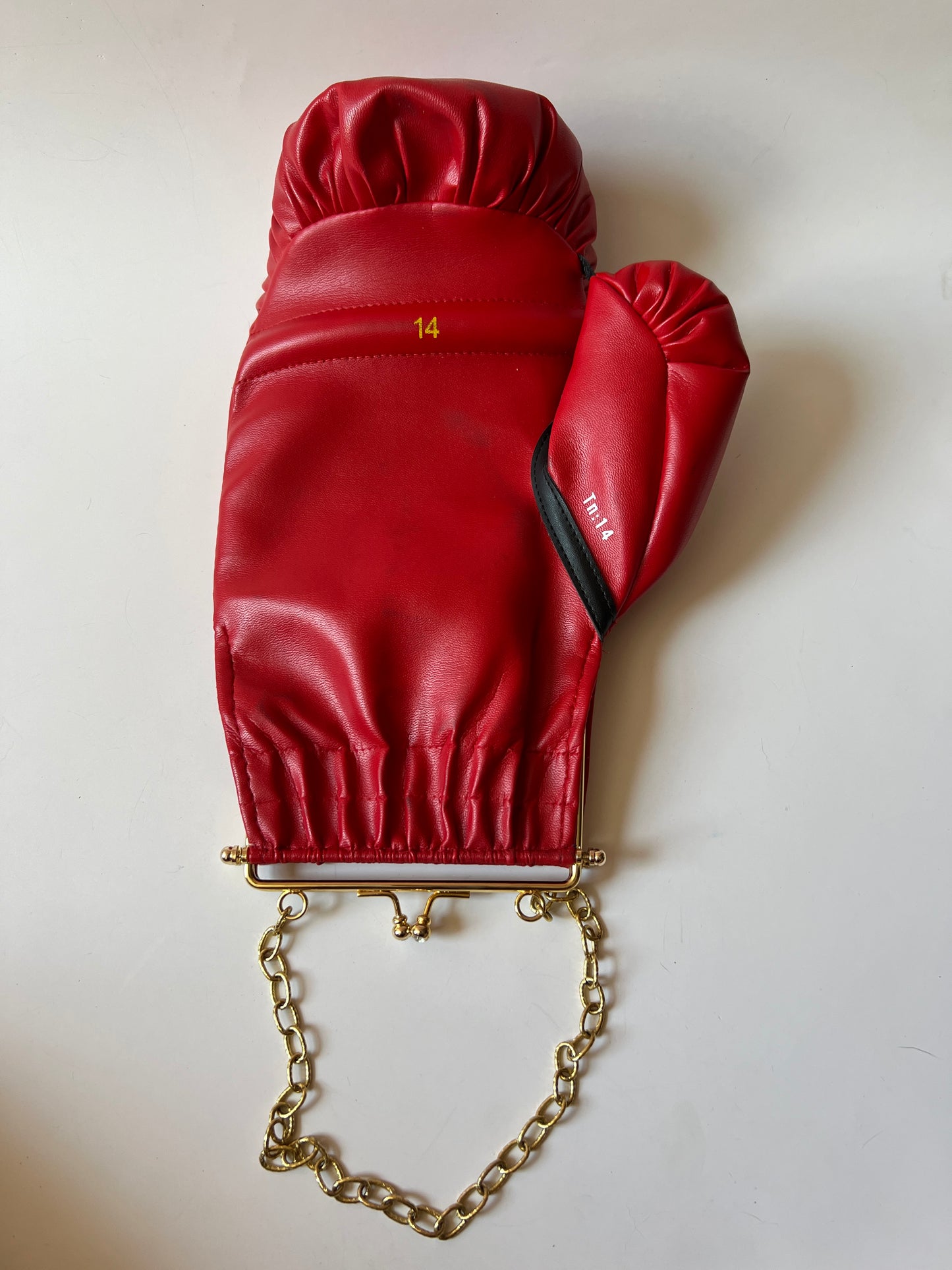 Punching Bag with Short Gold Chain